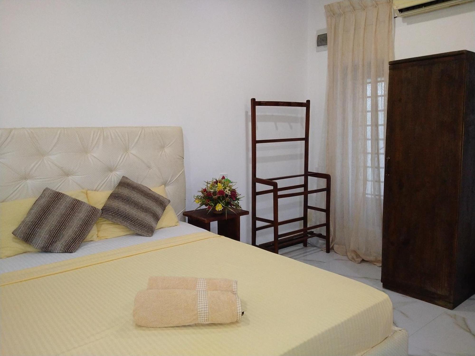Living Home Negombo Værelse billede